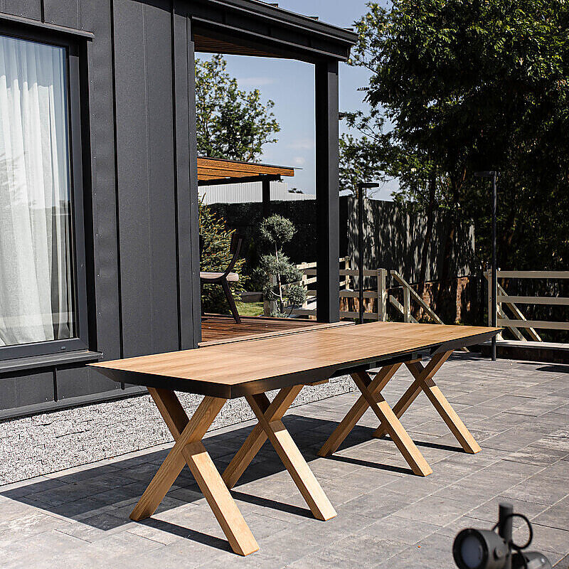 Extendable, natural wood dining table